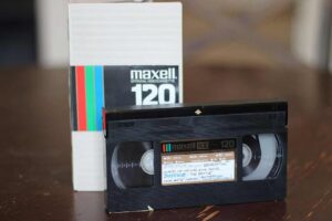 Most people tossed their VHS tapes years ago without a second thought. But now? Some of those clunky black cassettes are selling for thousands. The resurgence of retro collecting—and a wave of nostalgia for the analog era—has turned certain VHS tapes into serious collector items. And if you’ve got the right ones, you could be sitting on unexpected cash. Disney “Black Diamond” Editions The most talked-about VHS collectibles are Disney’s “Black Diamond” tapes, released between 1984 and 1994. These titles feature a small black diamond logo on the spine that says “The Classics.” Titles like Beauty and the Beast, Aladdin, and The Little Mermaid are highly sought after—especially in unopened condition. Some have sold on eBay for $1,000 or more, although prices vary wildly. Condition, edition, and packaging all matter. But if you have a sealed copy, it’s definitely worth checking the market. Out-of-Print Horror Titles Horror VHS collectors are one of the most active buyer groups. Rare, low-budget titles from the 80s and early 90s—especially ones that never made it to DVD—can fetch hundreds. Think cult classics, foreign slashers, or obscure zombie flicks. Tapes from defunct distributors like Wizard Video, Vestron, or Media Home Entertainment are especially valuable. A rare title in good condition with the original clamshell case can go for $200–$2,000 depending on rarity. First Releases and “Screeners” Collectors pay a premium for first-edition VHS releases—especially if they were limited or promotional. “Screener” tapes (usually marked “Not for Resale”) were sent to video stores for preview purposes. Ironically, those not-for-sale warnings now make them more collectible. Early releases from major franchises—like a 1979 screener of Alien or a first-edition Star Wars tape—can sell for serious money if the label and box are intact. Factory-Sealed Is a Whole Different Game If you’re holding a factory-sealed tape, you’re in another league. Sealed VHS tapes are being graded and slabbed—similar to comic books and trading cards. A sealed, graded copy of Back to the Future recently sold for over $75,000 at auction. Condition, shrink wrap style, and sticker placement all impact value. It might sound crazy, but sealed tapes are quickly becoming a new category of alternative assets. Genre Matters More Than You Think Not all VHS tapes are valuable—most common titles are still worth a few bucks at best. But certain genres—like horror, sci-fi, wrestling, and niche documentaries—tend to have the most upside. It’s about rarity and fan demand, not just age. If it was weird, banned, or low-budget back in the day, there’s probably a collector looking for it now. The Bottom Line VHS might be a dead format—but in the collector world, it's just getting started. Whether you’ve got a box of old tapes in storage or you’re hunting at yard sales, knowing what to look for can turn junk into cash. And with prices still climbing, the right tape could surprise you in a big way.