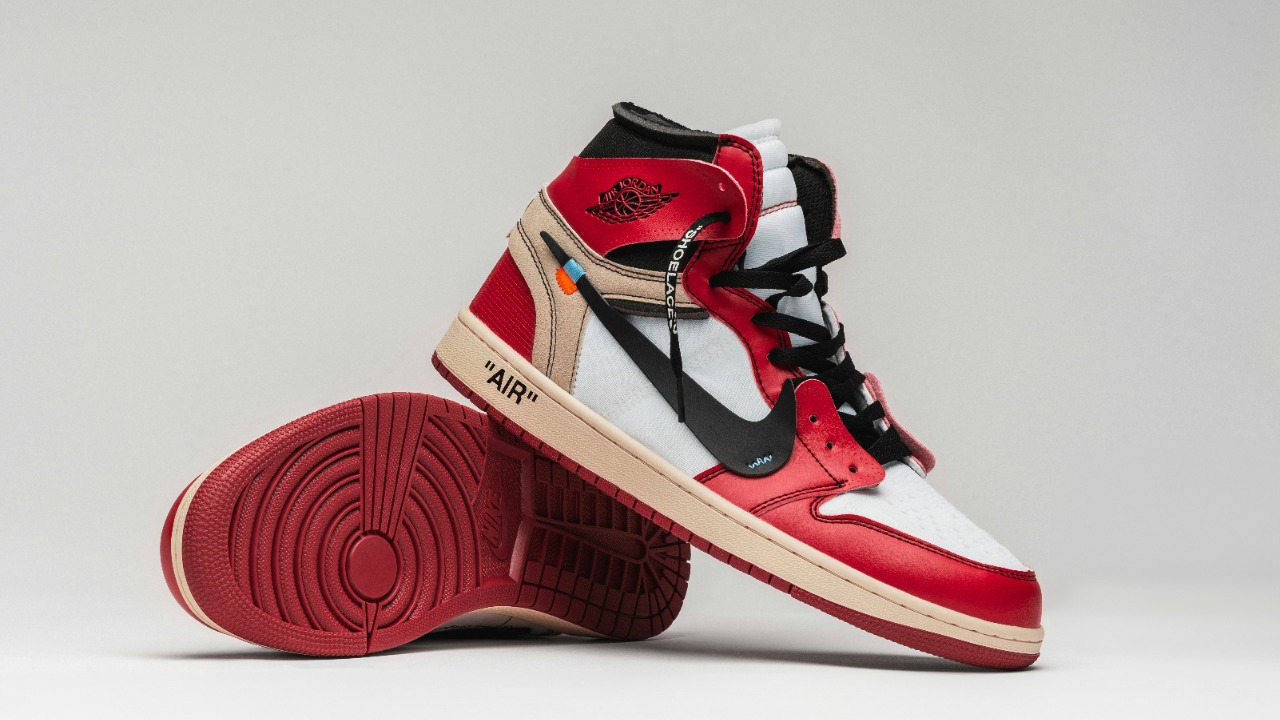 Image Credit: a pair of red, white and black sneakers — Karsten Winegeart