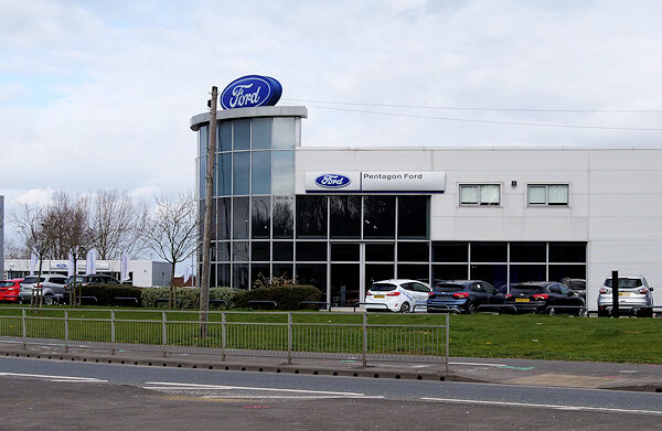 Image Credit: Pentagon Ford Dealership by David Dixon, CC BY-SA 2.0/Wiki Commons