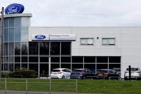 Image Credit: Pentagon Ford Dealership by David Dixon, CC BY-SA 2.0/Wiki Commons