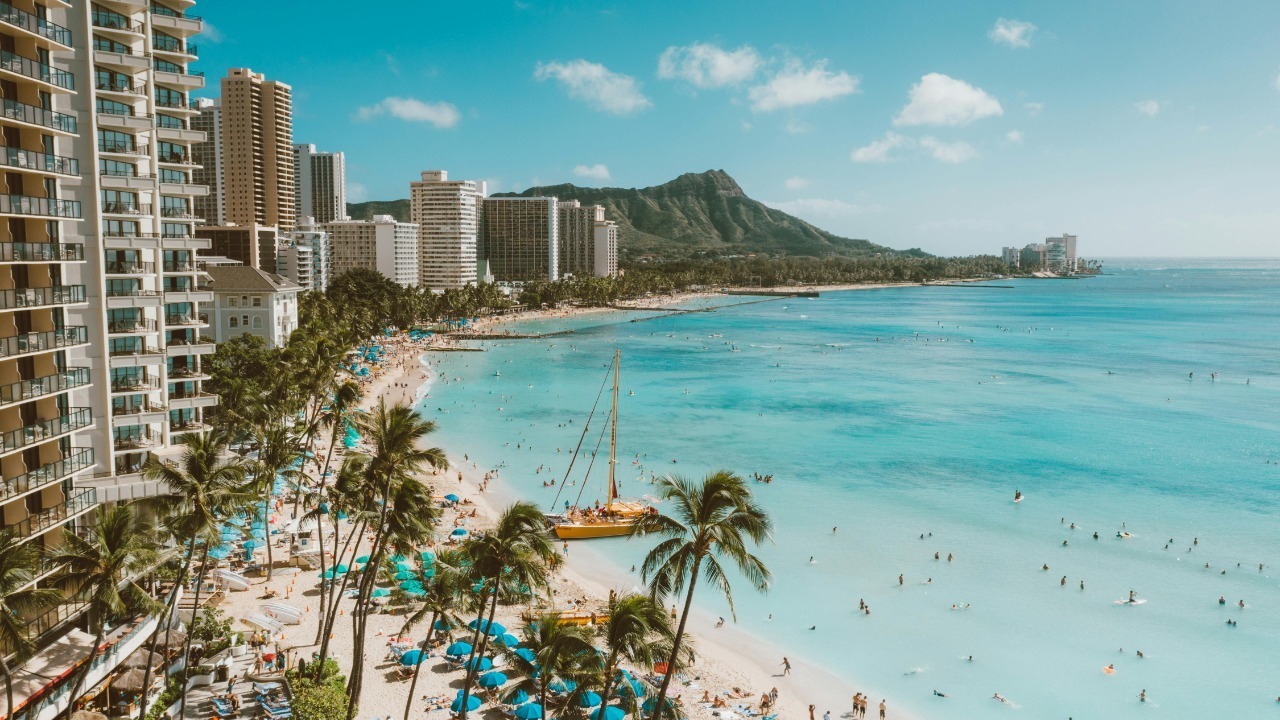 A stunning aerial view of Waikiki Beach, Honolulu with Diamond Head in the background.