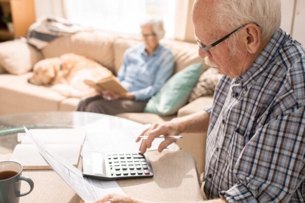Senior Man Filling Forms