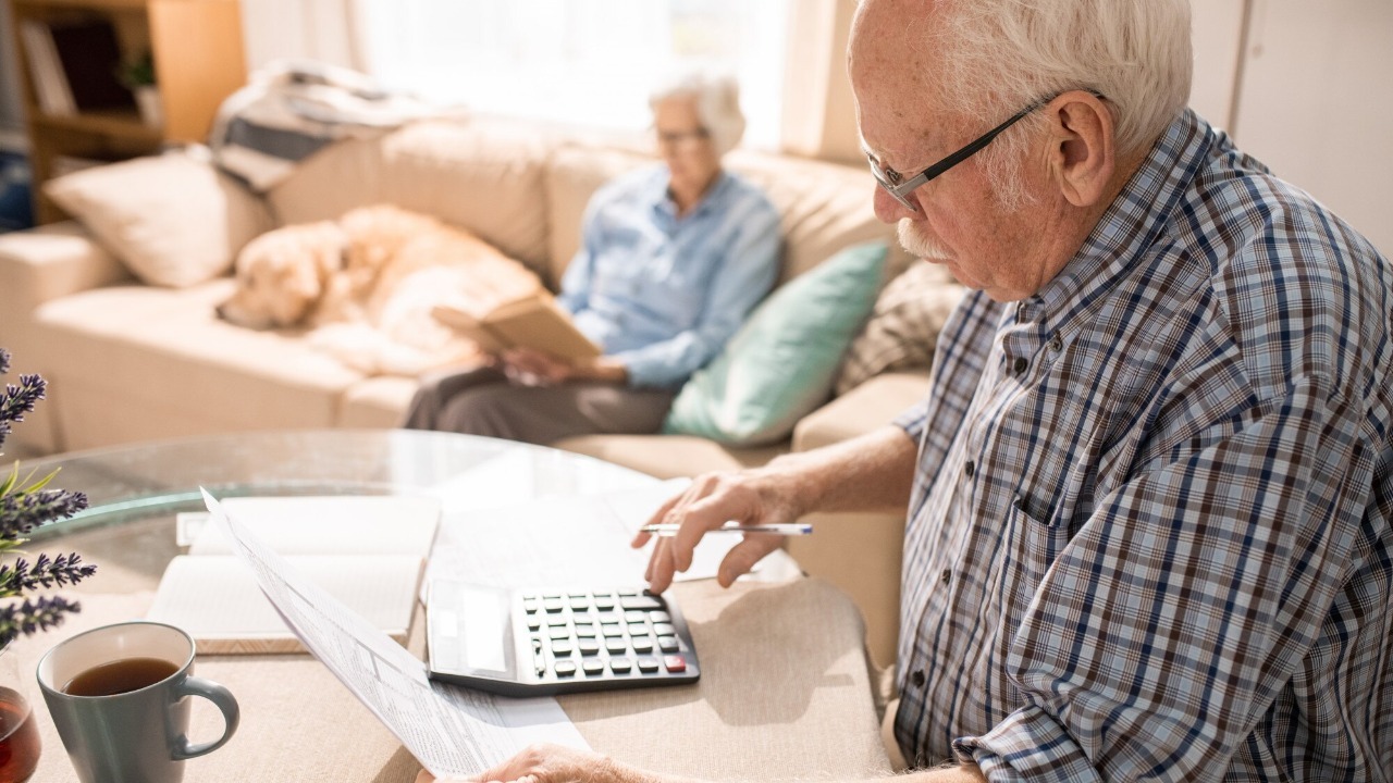 Senior Man Filling Forms
