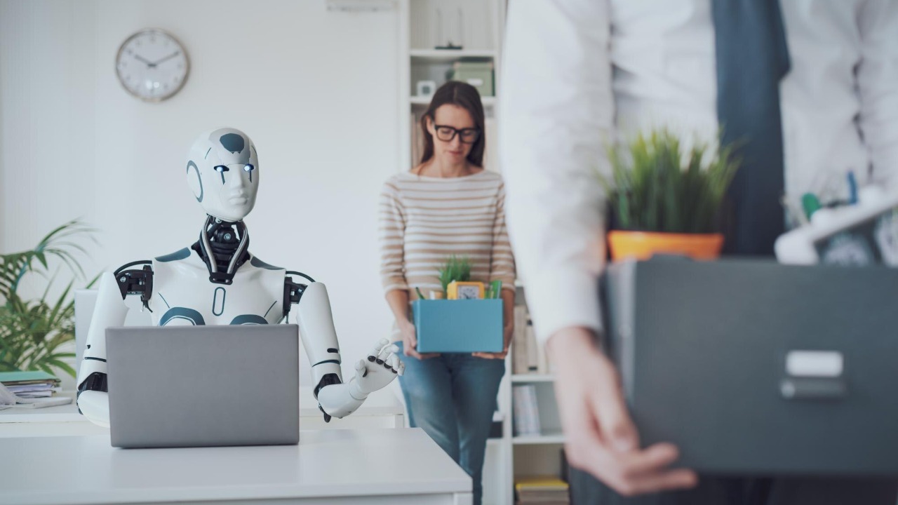 The impact of AI on jobs fired business people leaving the office