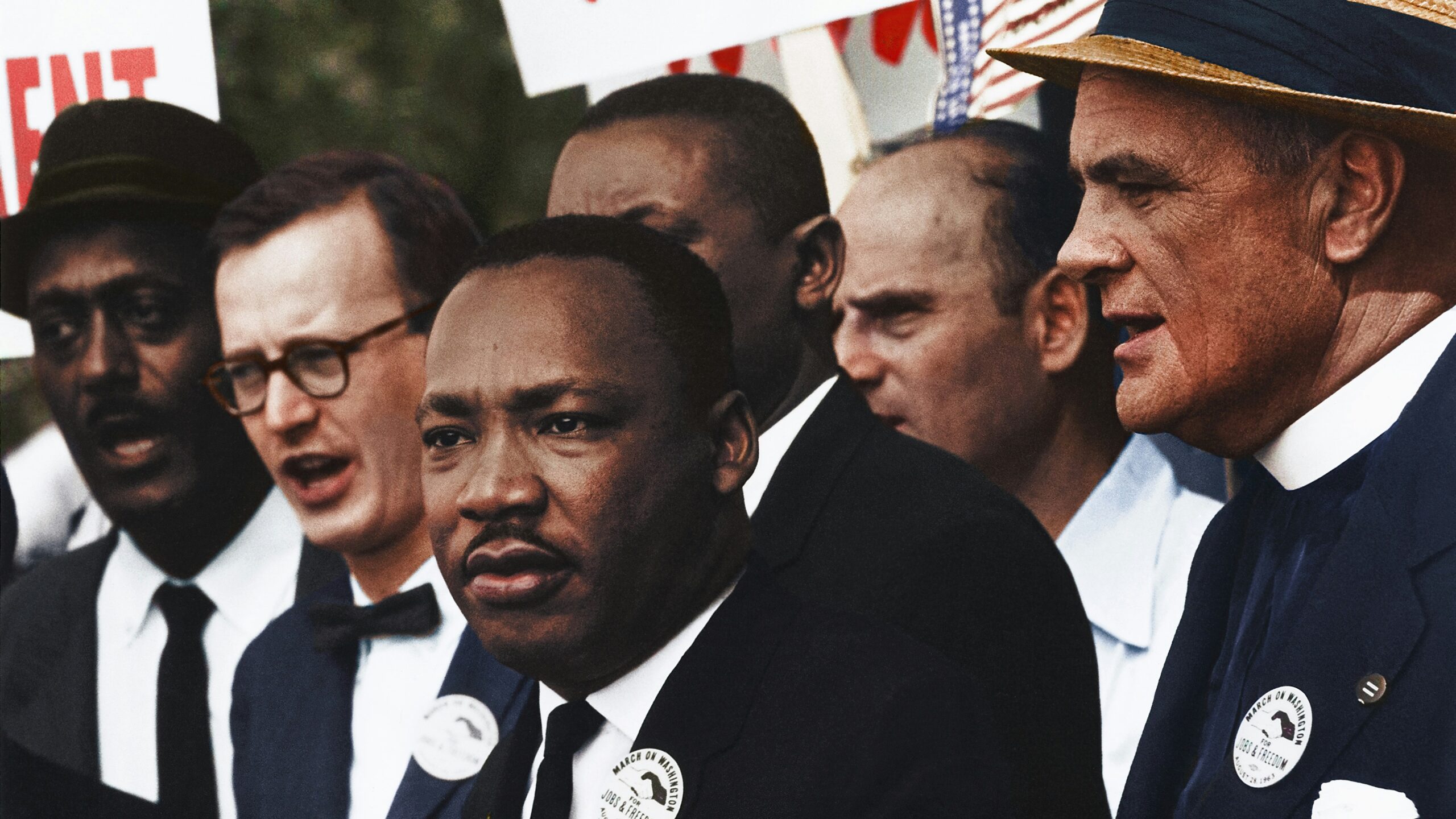Dr. Martin Luther King, Jr. and Mathew Ahmann in a crowd of demonstrators at the March on Washington