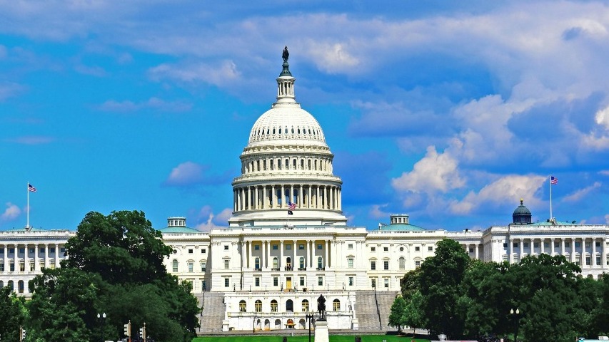Stunning daytime view of the United States Capitol Building in Washington, DC, on a clear day.