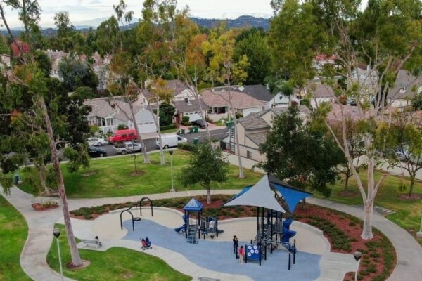 Suburban packed homes neighborhood with small park Vast subdivision in Irvine California USA