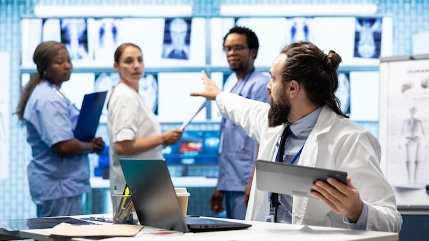 Healthcare experts in a strategic meeting discussing treatment protocols