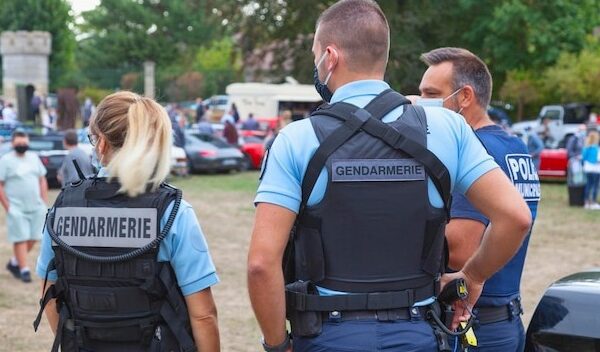Two gendarmes and a municipal police officer