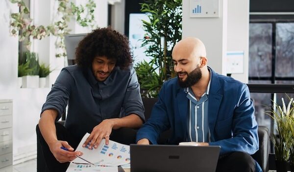 Business team examine annual reports