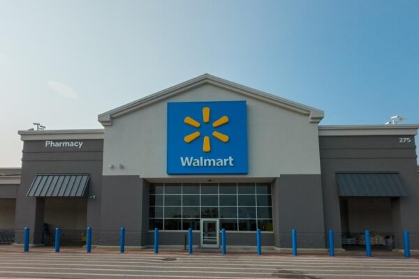Walmart is a large store with a blue sign on the front
