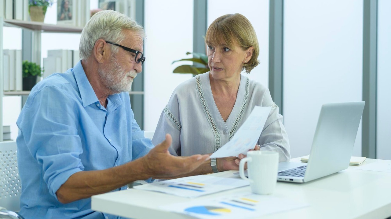 Caucasian senior Business people working and brainstorming in modern office