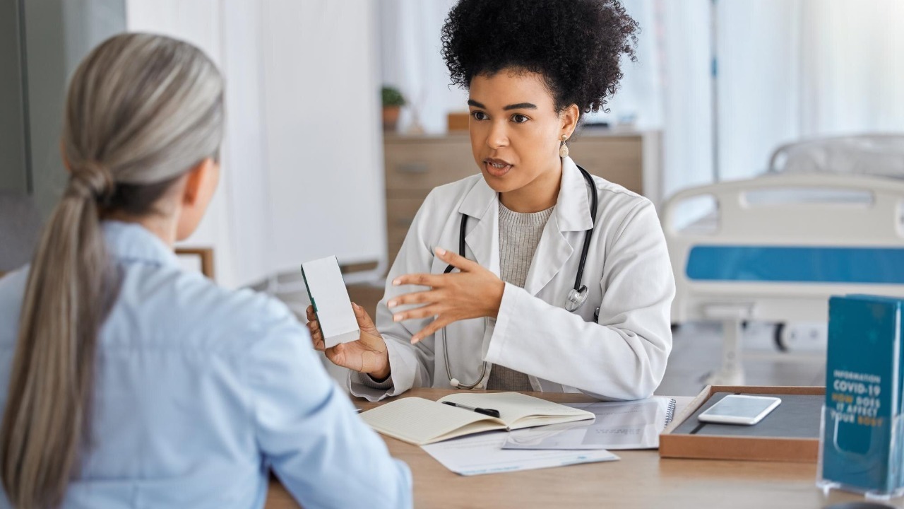 Health consultation with doctor and patient hospital and medicine prescription healthcare and help at medical office Women communication and advice health insurance and health care talk