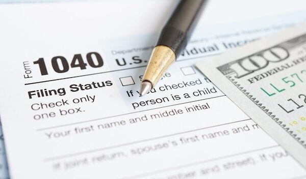 Tax form 1040 US Individual Income Tax Return business finance concept