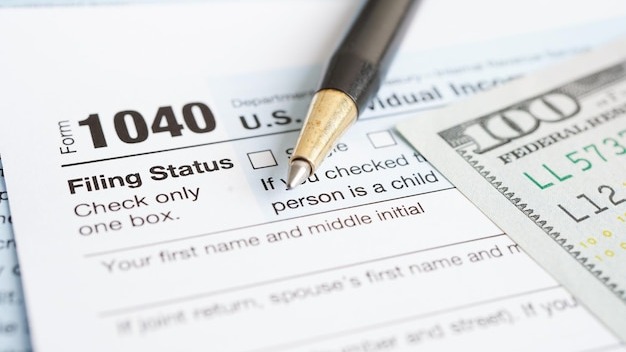 Tax form 1040 US Individual Income Tax Return business finance concept