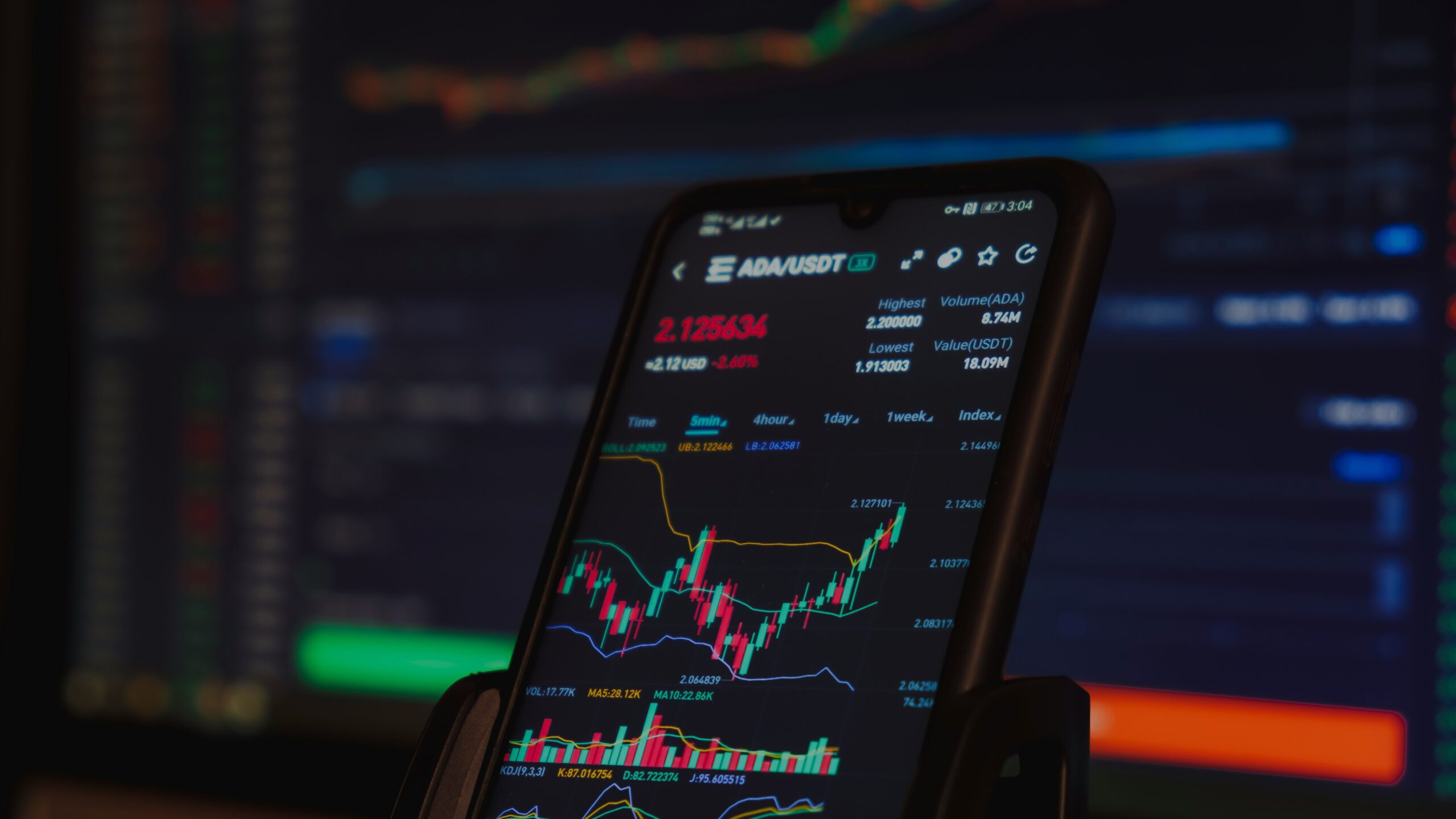 black android smartphone on brown wooden table