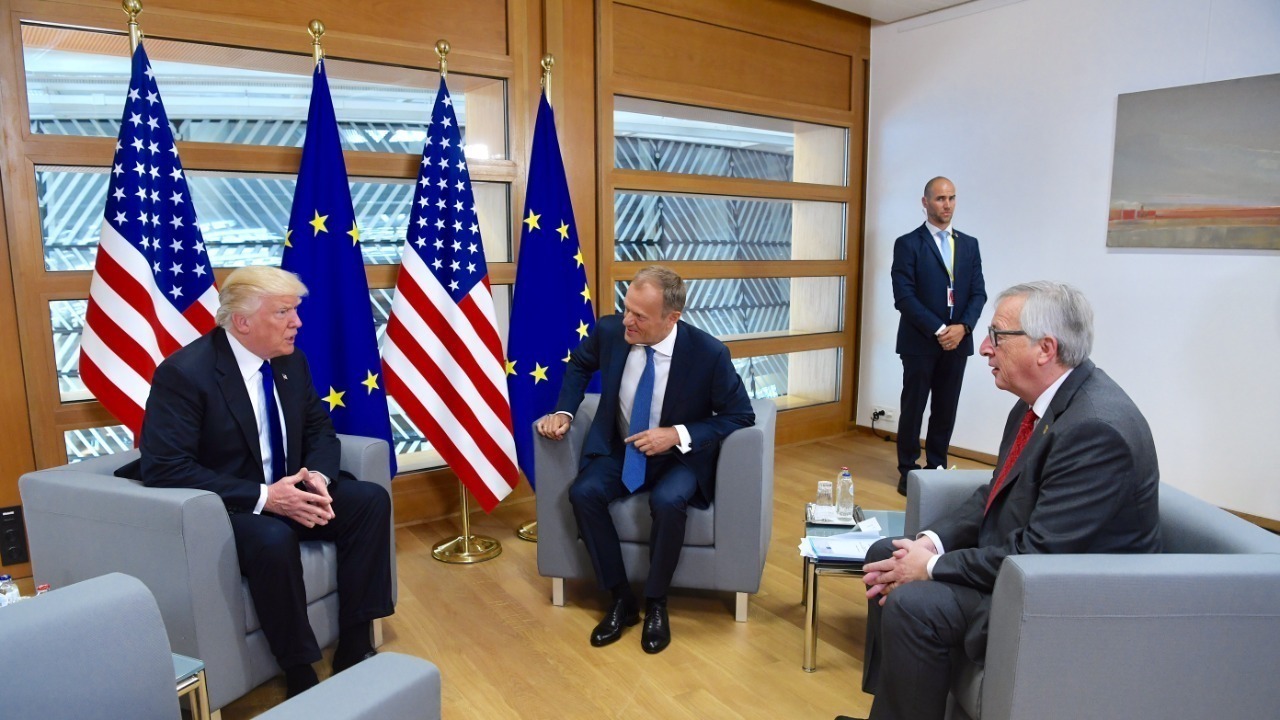 President Donald Trump, Jean-Claude Juncker, and Donald Tusk in discussions
