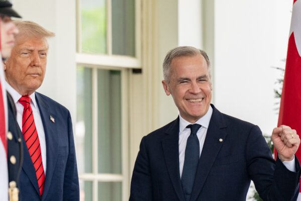 Donald Trump greets Prime Minister of Canada Mark Carney, Tuesday, May 6, 2025, at the West Wing entrance of the White House