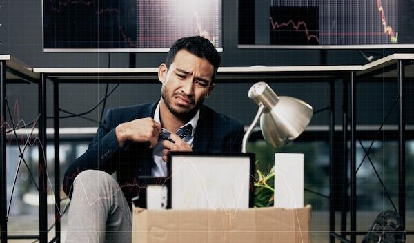 Businessman stress and unemployment in office with worry anxiety or sad for job loss Stock broker employee and mental health in market crash recession or financial crisis and retrenched on floor