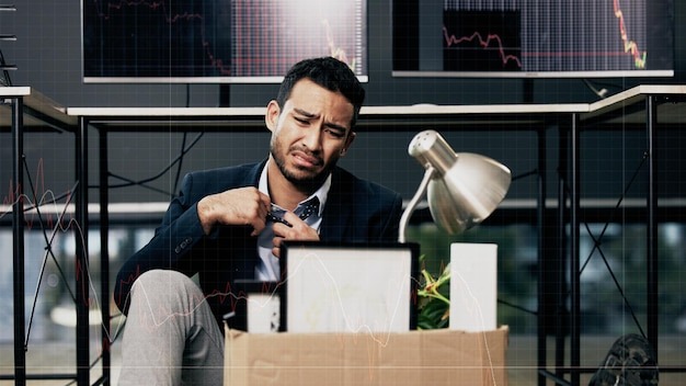 Businessman stress and unemployment in office with worry anxiety or sad for job loss Stock broker employee and mental health in market crash recession or financial crisis and retrenched on floor