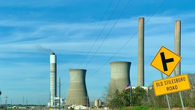 Road sign against sky