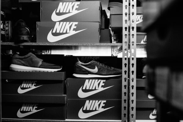 a black and white photo of a pair of nike shoes