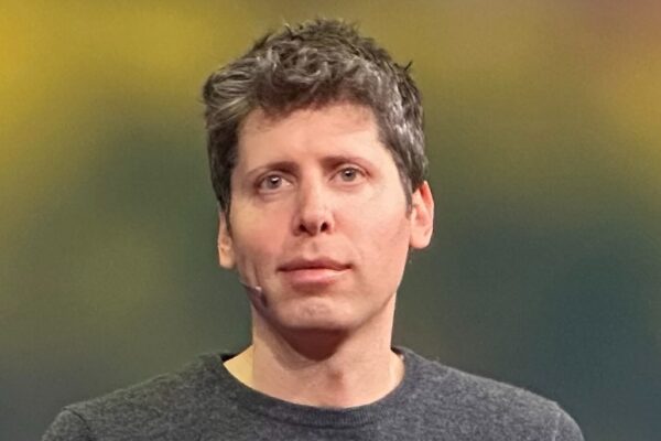 Sam Altman speaking at TED (cropped)