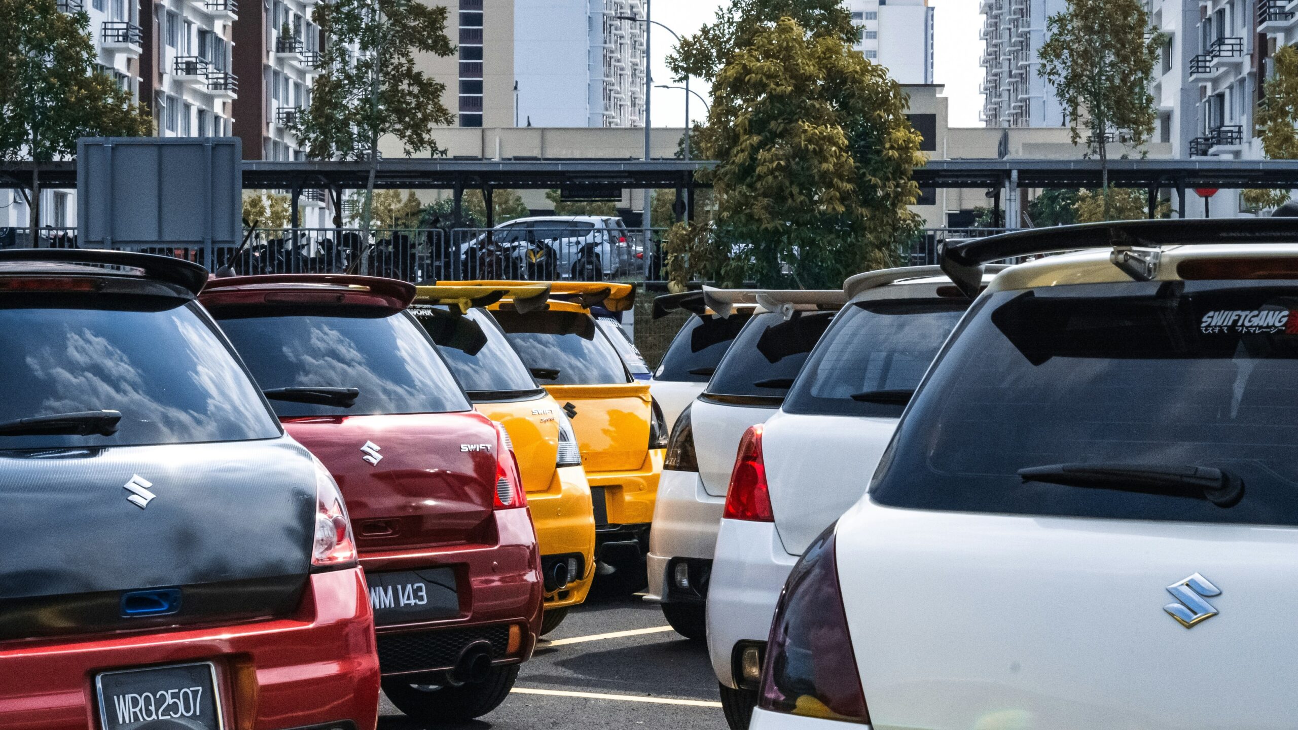 a group of cars in a parking lot