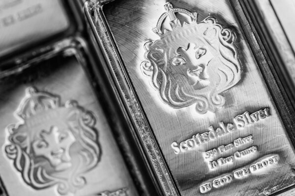 A bunch of silver bars stacked on top of each other