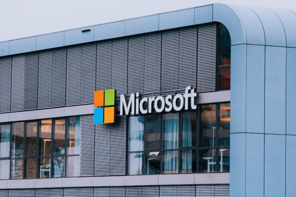 A tall building with a microsoft logo on it