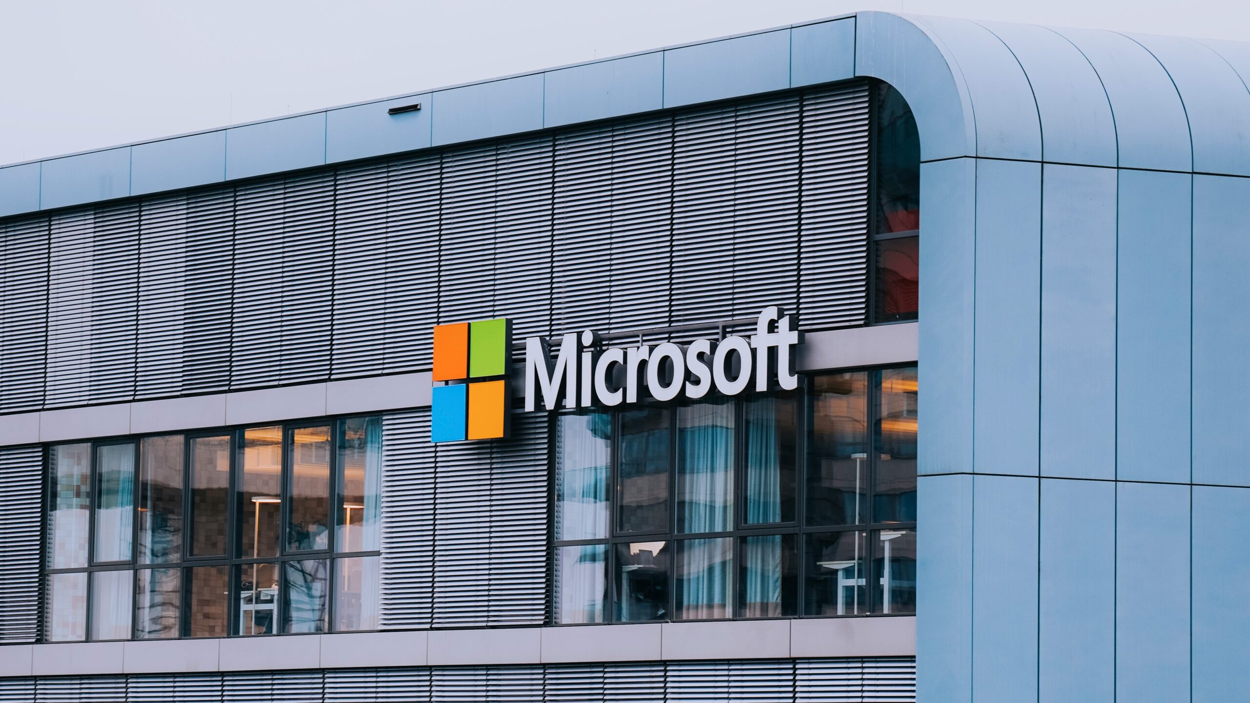 A tall building with a microsoft logo on it