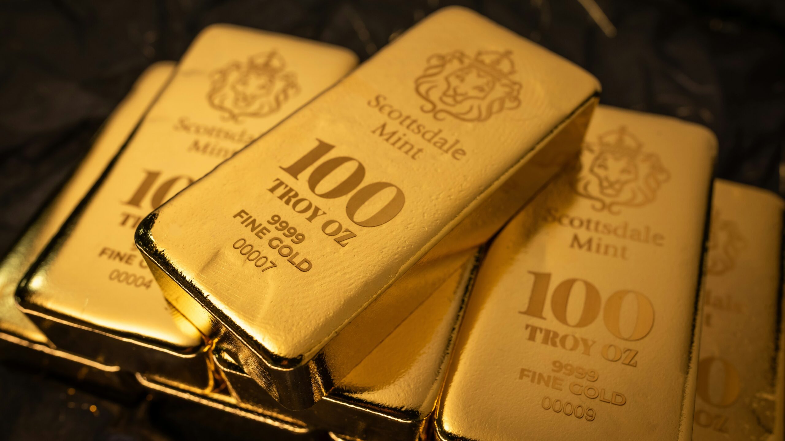 Stack of 100 troy ounce fine gold bars