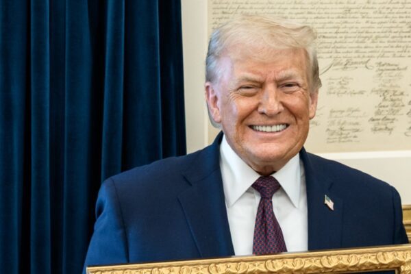 2026 gift to President Donald Trump of the Nobel Peace Prize medal awarded to Maria Corina Machado at the White House Oval Office on 15 January (cropped)
