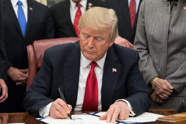 Donald Trump signing legislation 2018