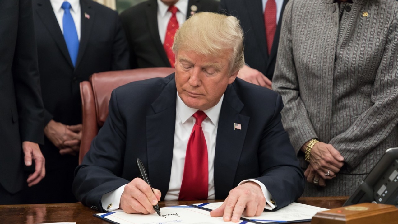 Donald Trump signing legislation 2018