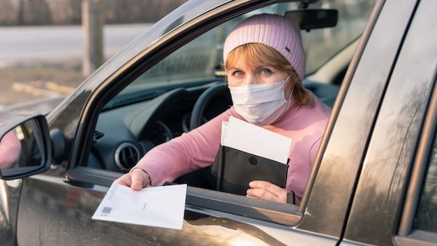 The driver of the car in the mashie during coronavirus covid-19
