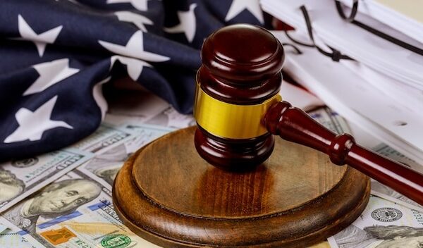 Judge's gavel with United States flag legislation and law judge