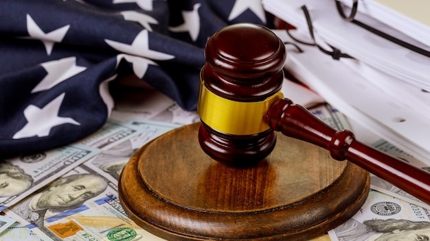 Judge's gavel with United States flag legislation and law judge