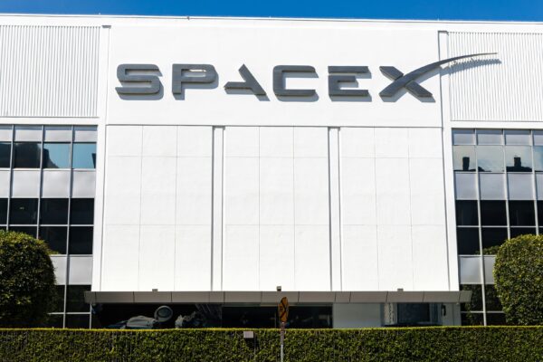 a building with a sign that says spacex on it