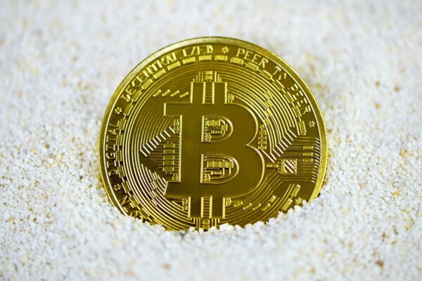 gold and black round coin