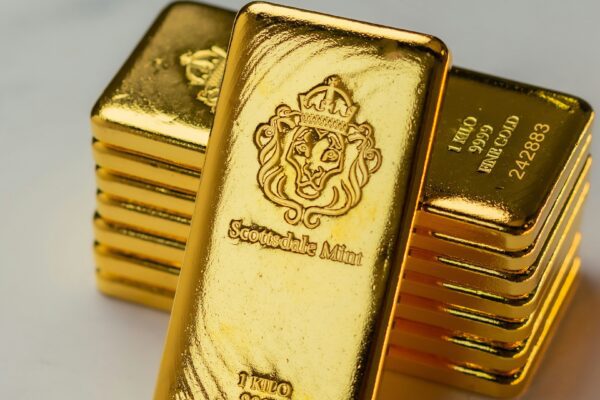 A stack of gold bars sitting on top of a table