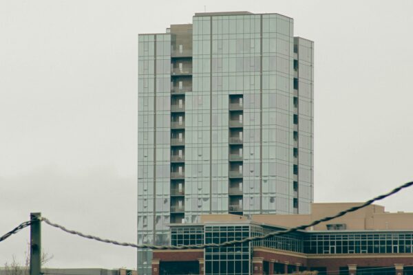 a tall building sitting next to a traffic light