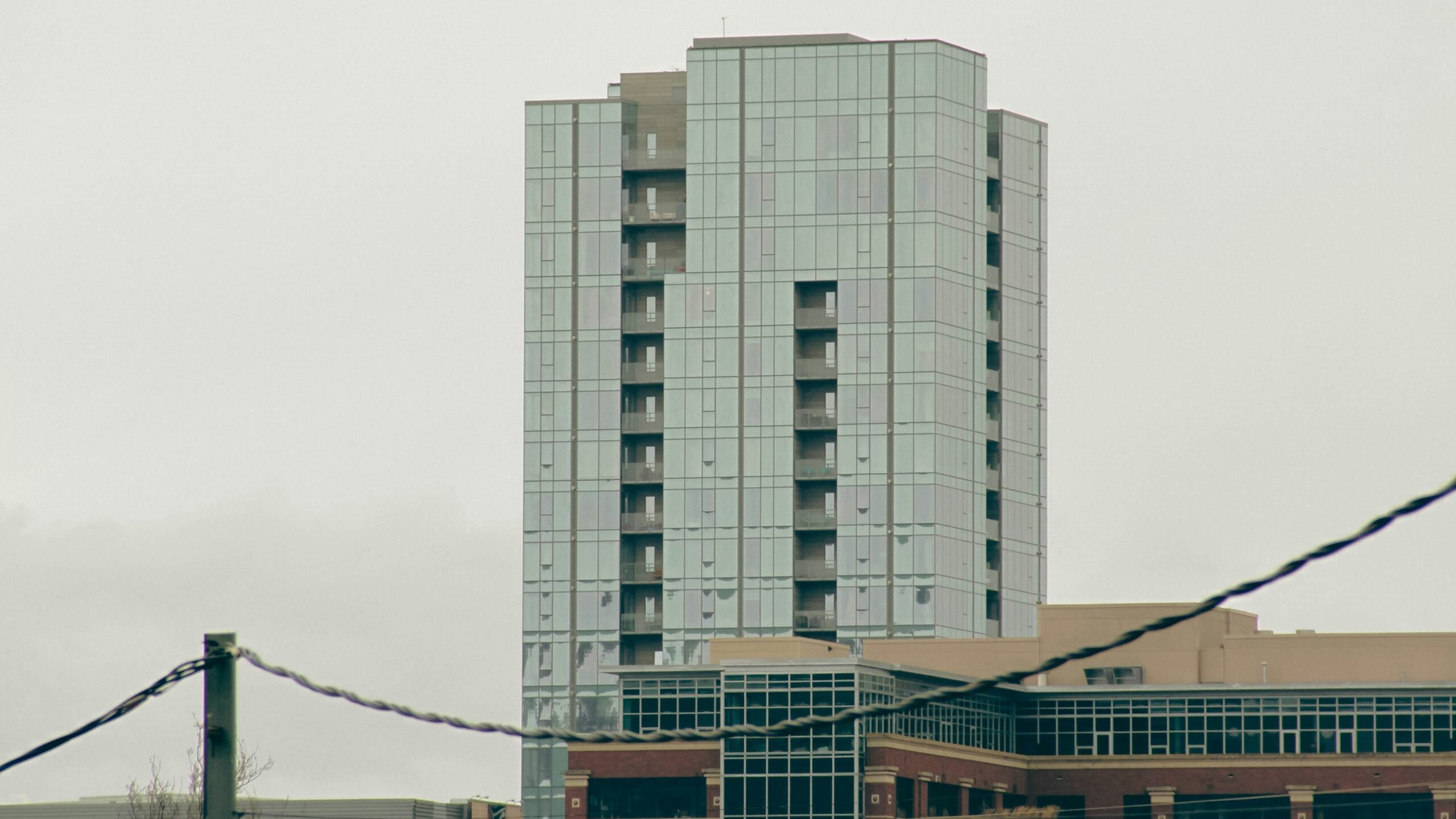 a tall building sitting next to a traffic light