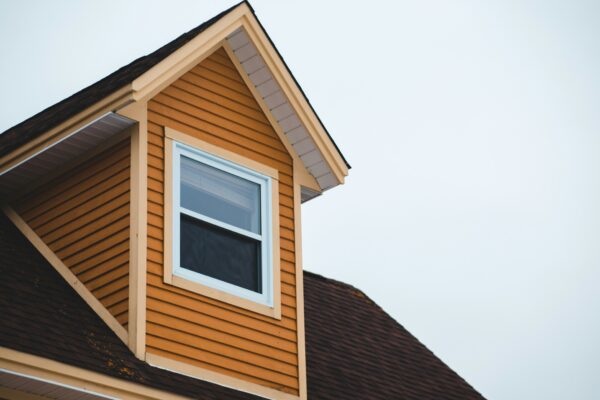 brown wooden house under white sky during daytime