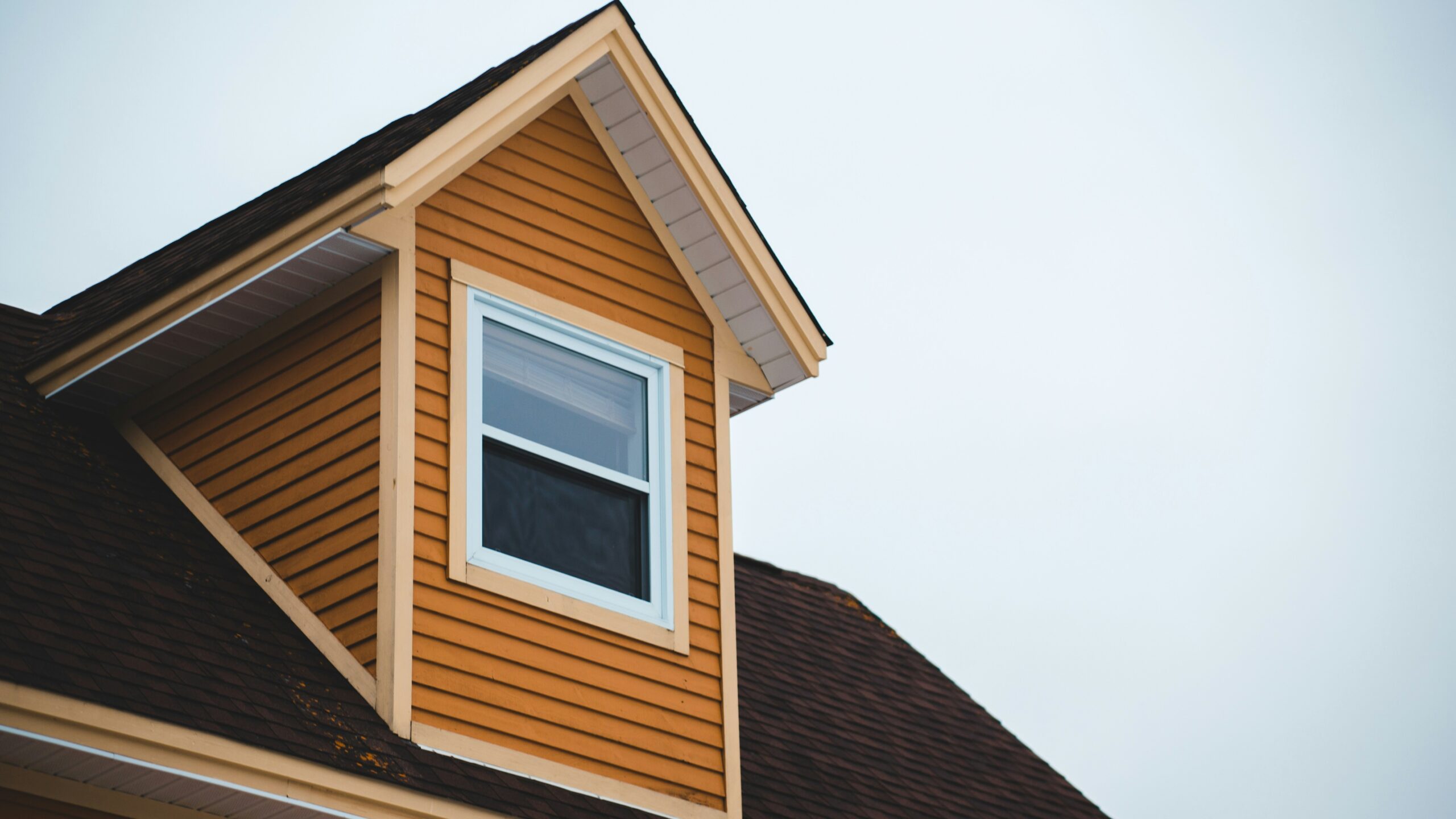 brown wooden house under white sky during daytime