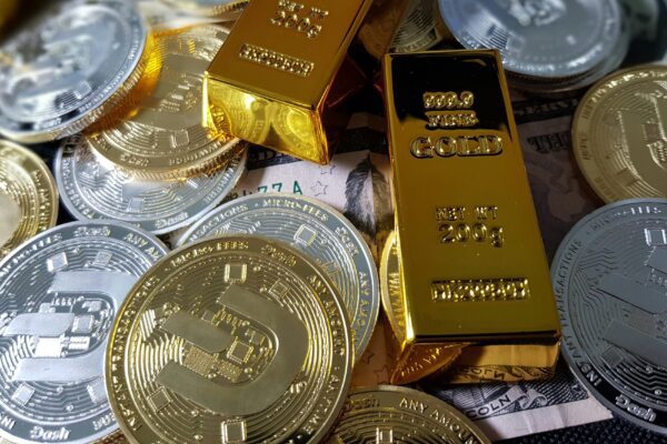 a pile of gold and silver coins