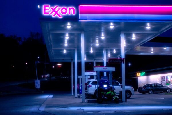 cars parked in front of UNKs store during night time