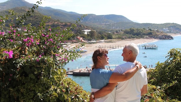 The concept of a romantic walk. A couple in love holding hands.