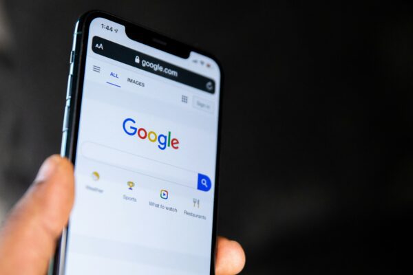 person holding black android smartphone