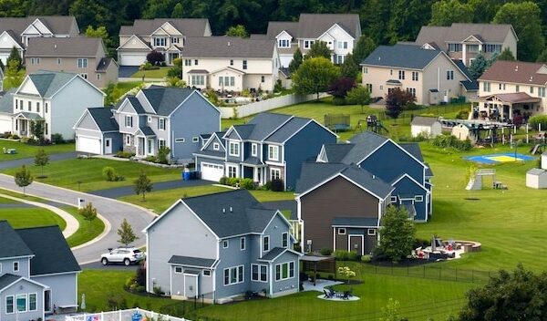 View from above of residential houses in living area in Rochester NY American dream homes as example of real estate development in US suburbs